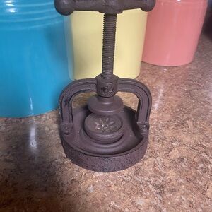 Antique-Style Cast Iron Nutcracker with Floral Detail - Brown